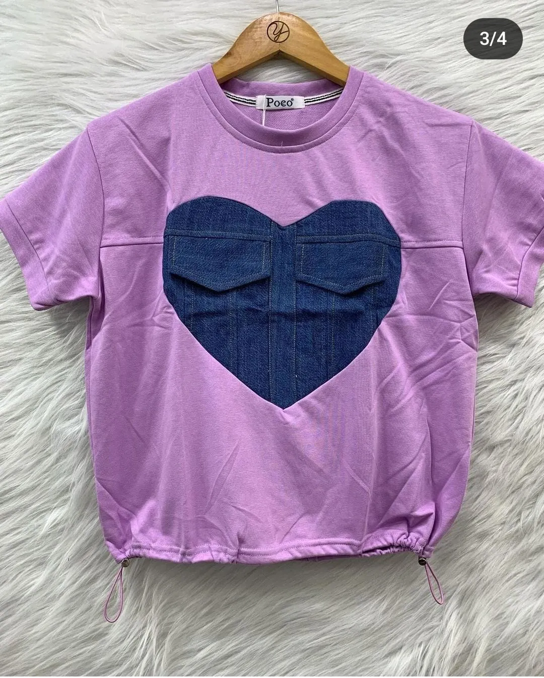 Designer top with denim detailing